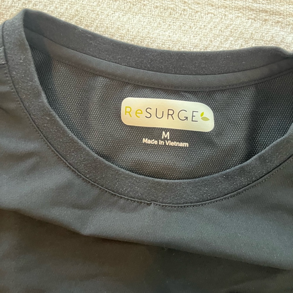 Woman’s T-shirt style scrub top.